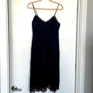 Like new Black cocktail dress by Guess, size 4. Worn once.